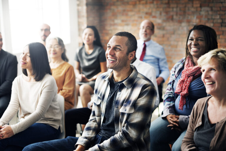 A smiling audience